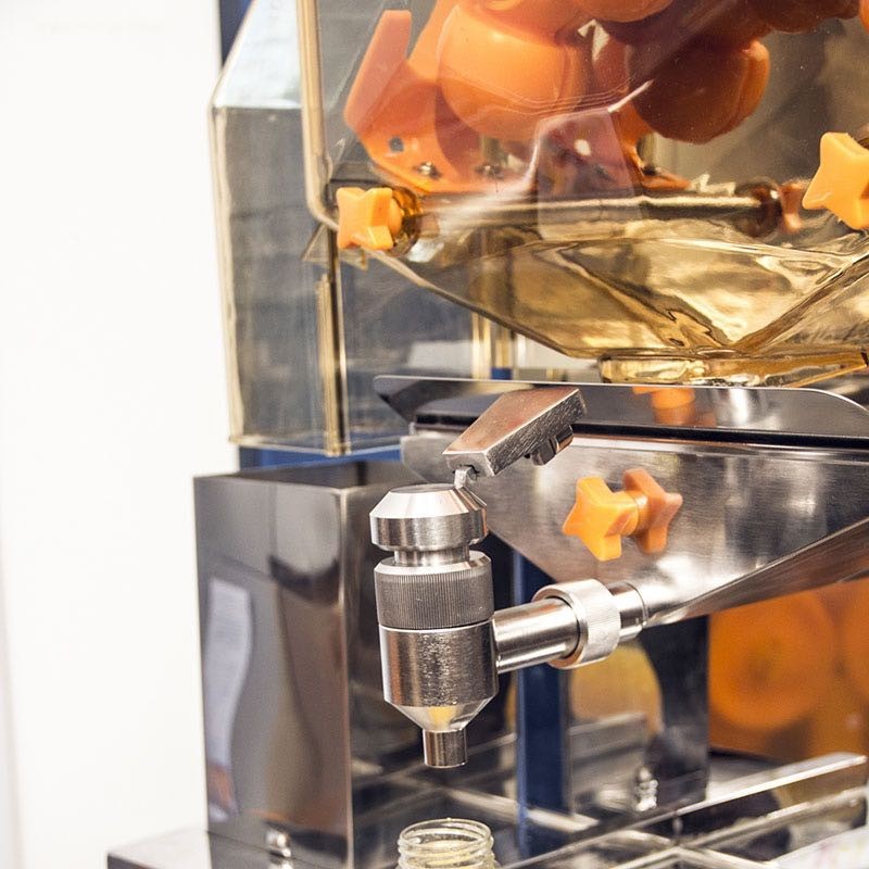 Presse orange automatique pour bouteilles de jus en libre service
